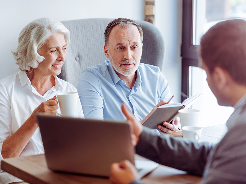 elder couple having a meeting with insurance agent atascosa tx